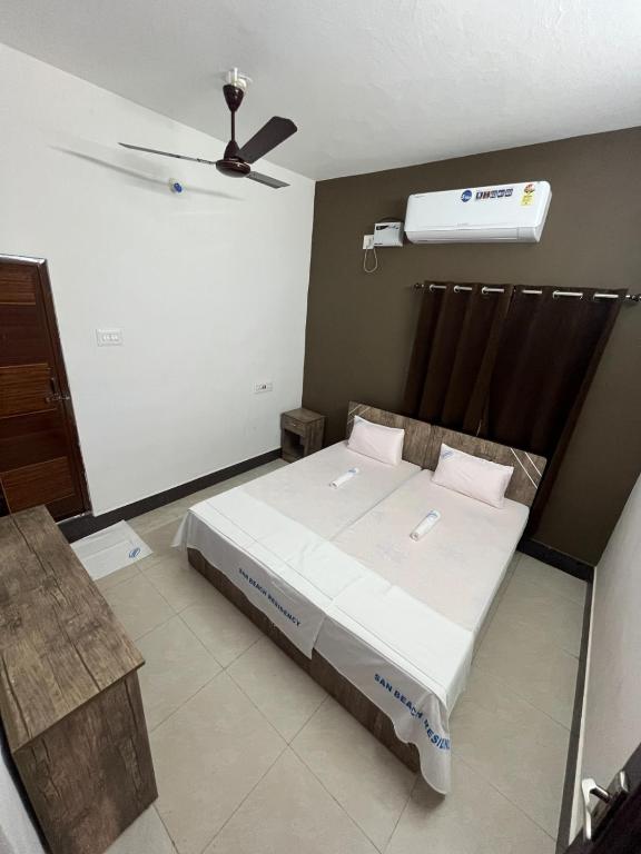 Postel nebo postele na pokoji v ubytování SAN BEACH RESIDENCY