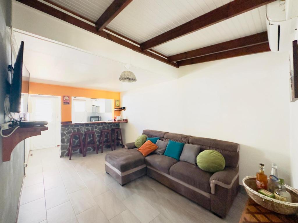TV a/nebo společenská místnost v ubytování Maison sur la plage