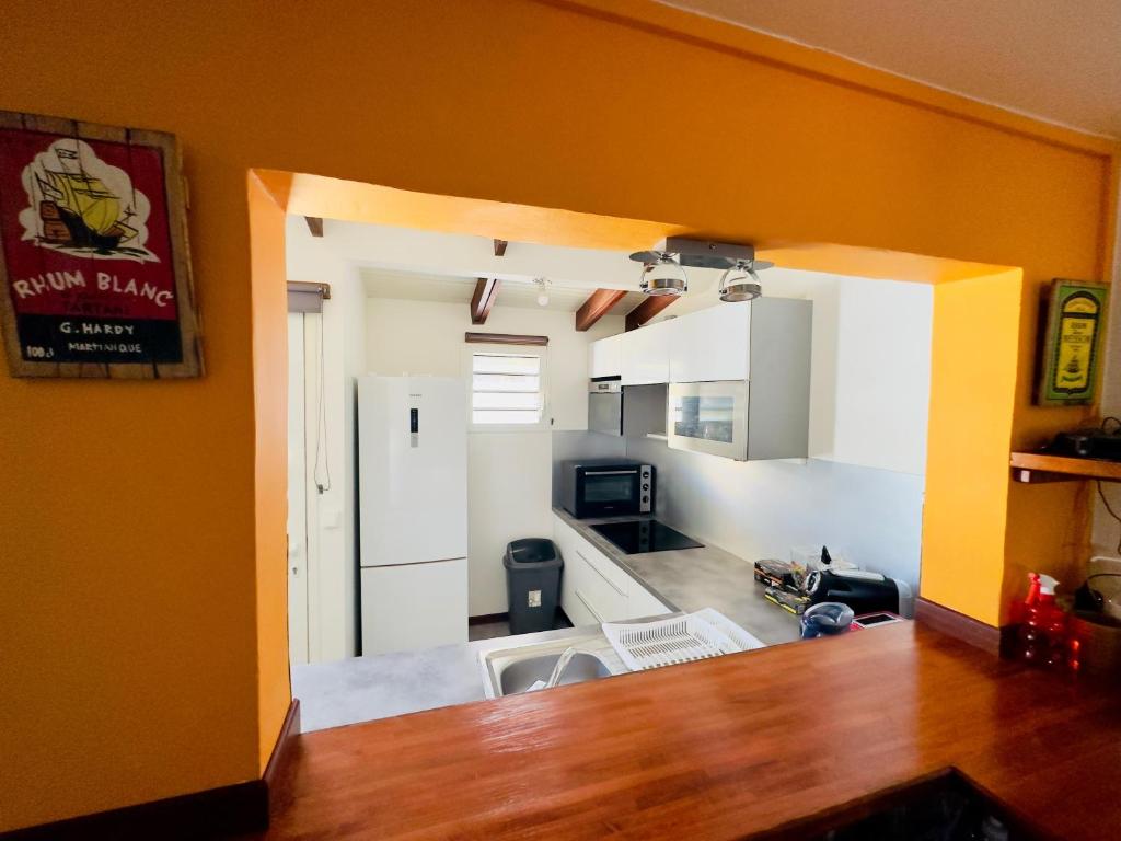 Kuchyň nebo kuchyňský kout v ubytování Maison sur la plage