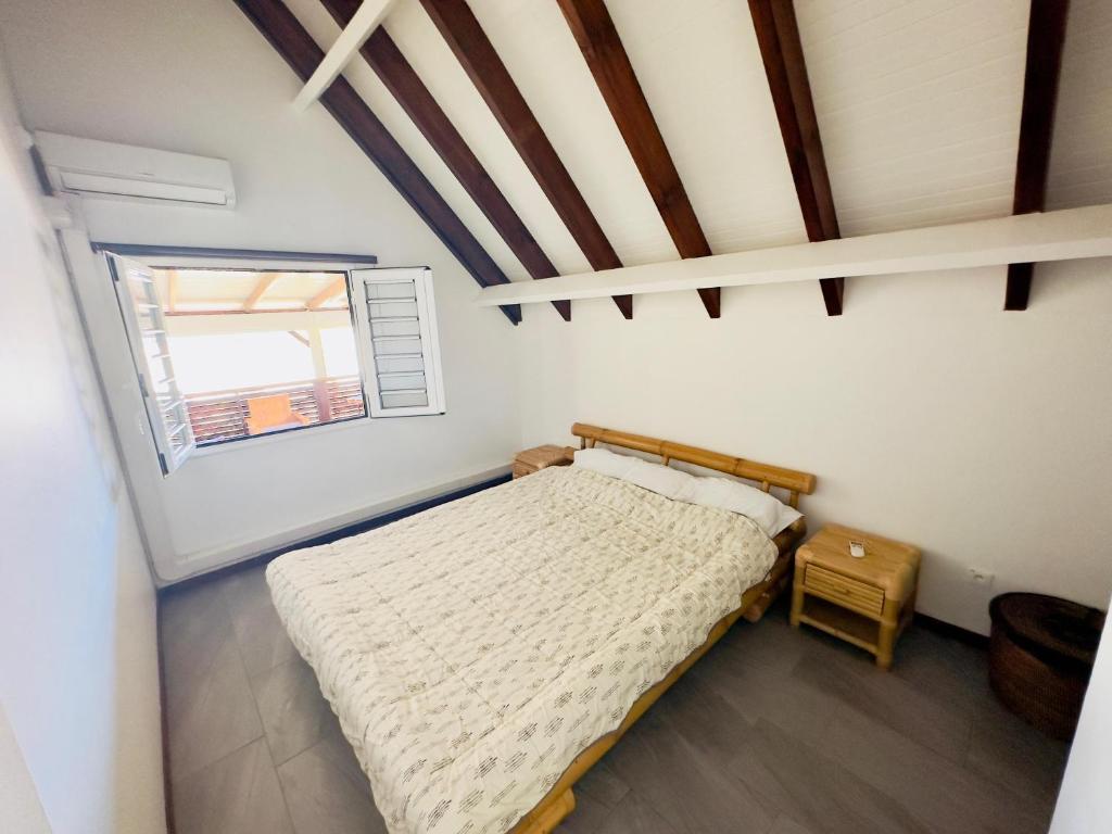 Postel nebo postele na pokoji v ubytování Maison sur la plage
