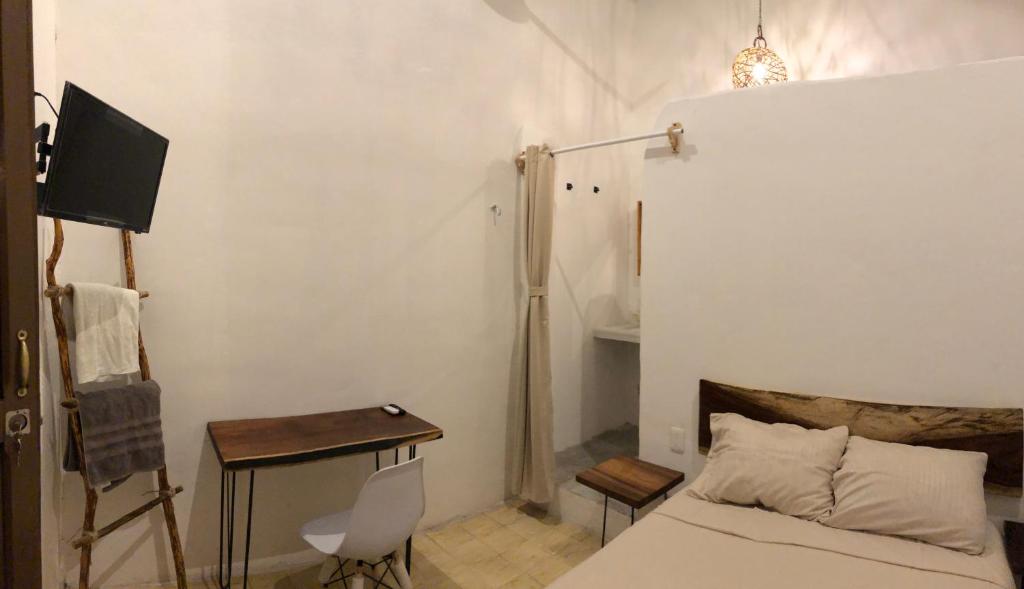 Postel nebo postele na pokoji v ubytování Bleu Downtown