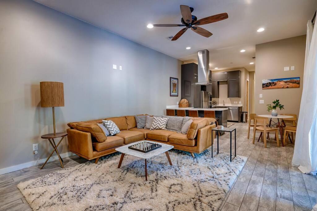 a living room with a couch and a table at The Chic Cabin Apartment in Flagstaff