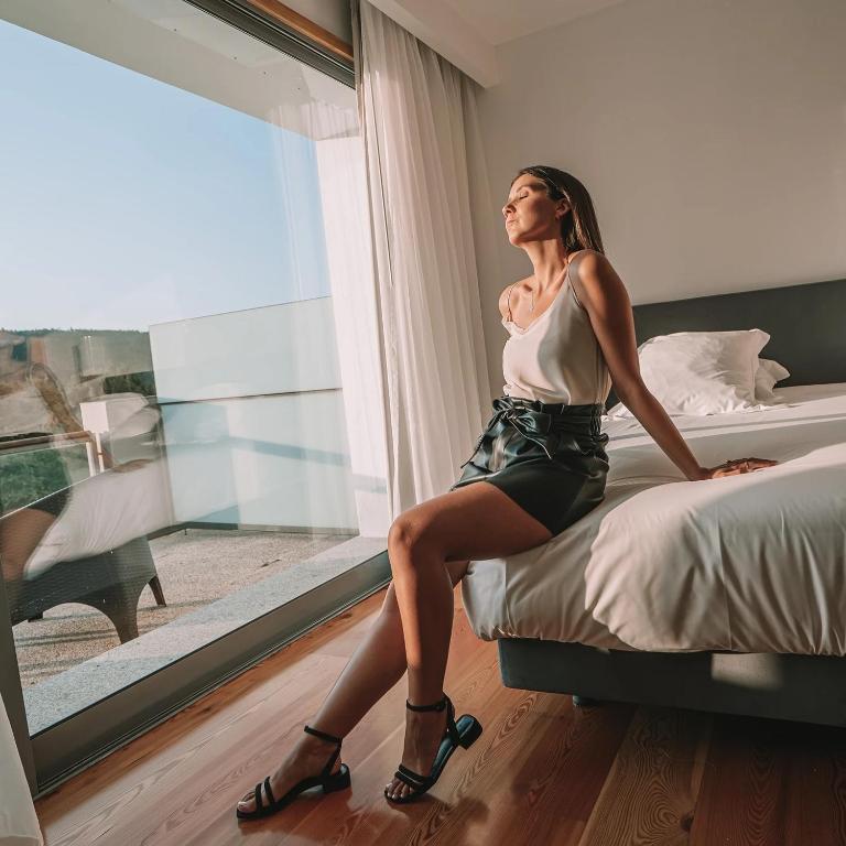 Postel nebo postele na pokoji v ubytování Monte Prado Hotel & Spa