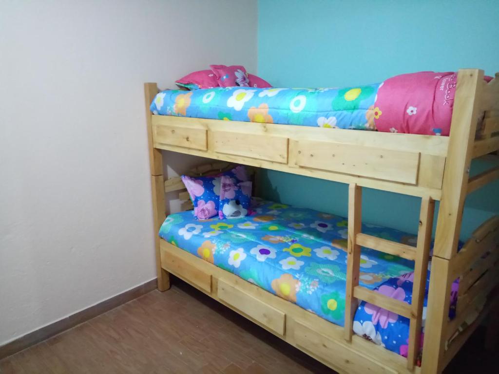 Postel nebo postele na pokoji v ubytování Casa 2600
