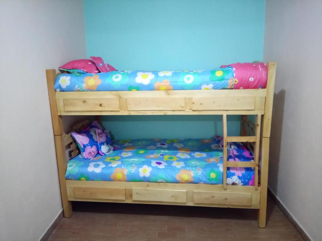 Postel nebo postele na pokoji v ubytování Casa 2600