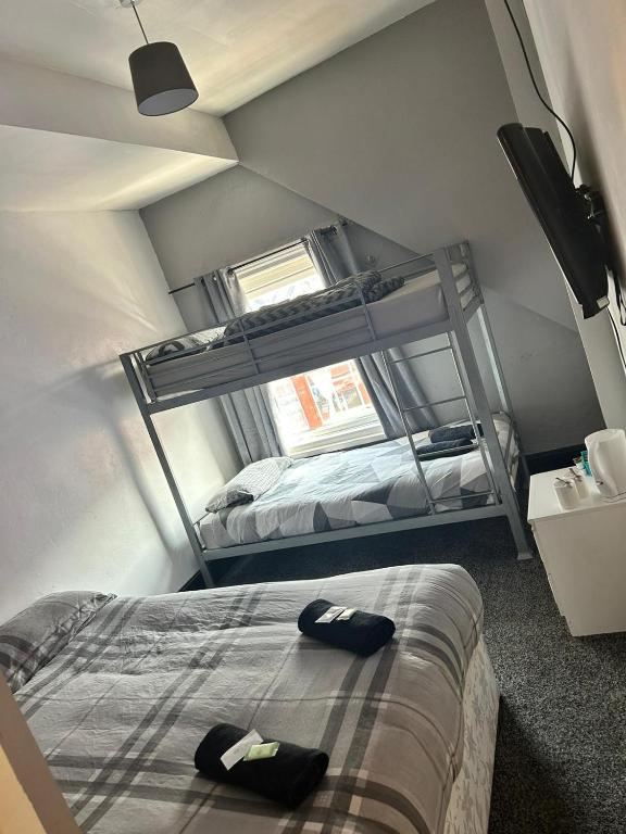 Postel nebo postele na pokoji v ubytování Adina Hotel