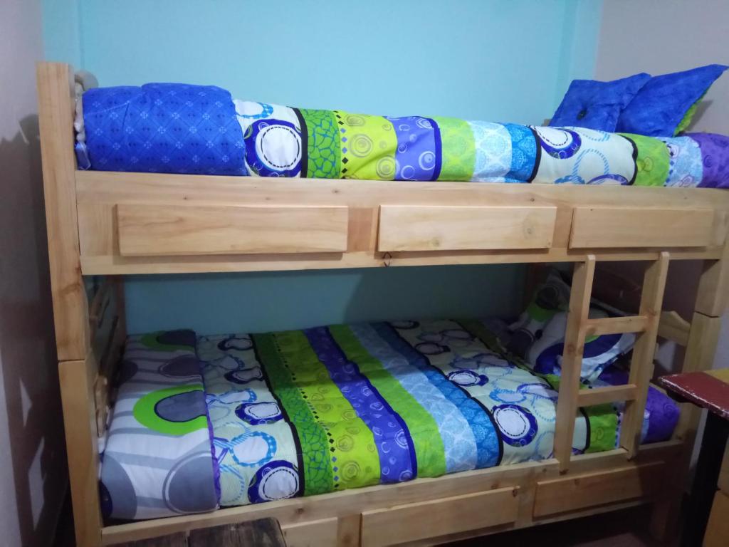 Postel nebo postele na pokoji v ubytování Casa 2600