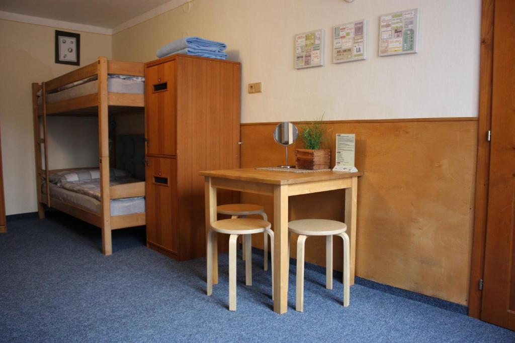 Postel nebo postele na pokoji v ubytování Hostel Postel