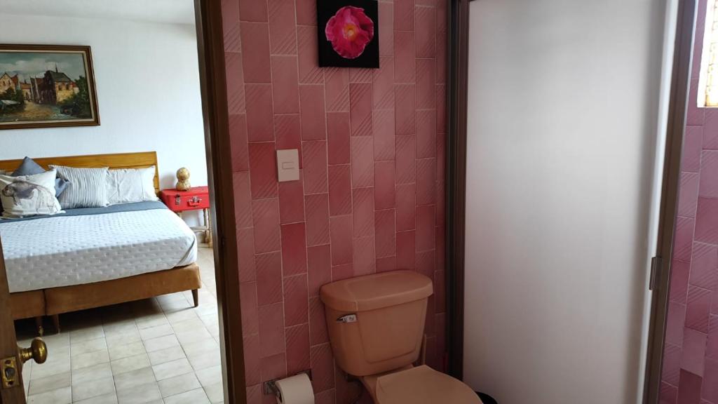 Postel nebo postele na pokoji v ubytování Casa Arena