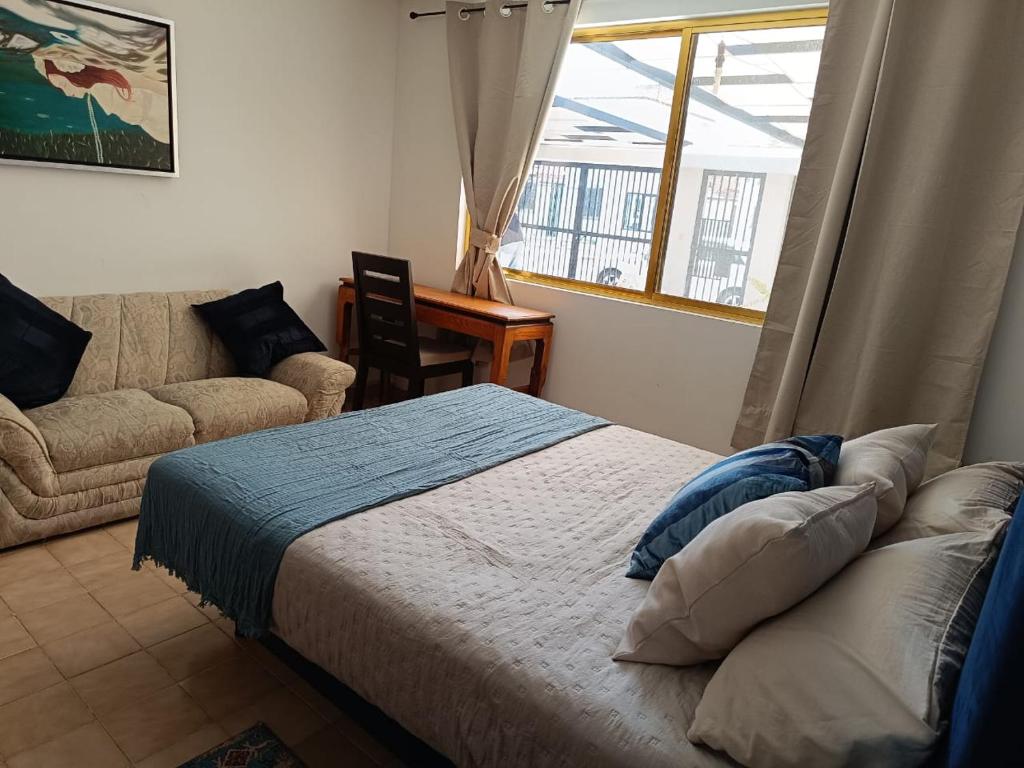 Postel nebo postele na pokoji v ubytování Casa Arena