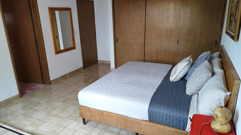 Postel nebo postele na pokoji v ubytování Casa Arena