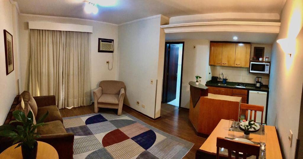 Η κουζίνα ή μικρή κουζίνα στο Apartamento aconchegante no Batel