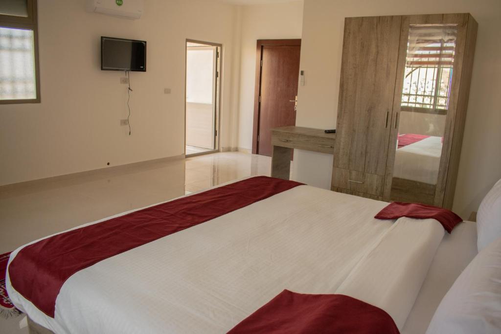 Postel nebo postele na pokoji v ubytování Twilight Hotel Petra