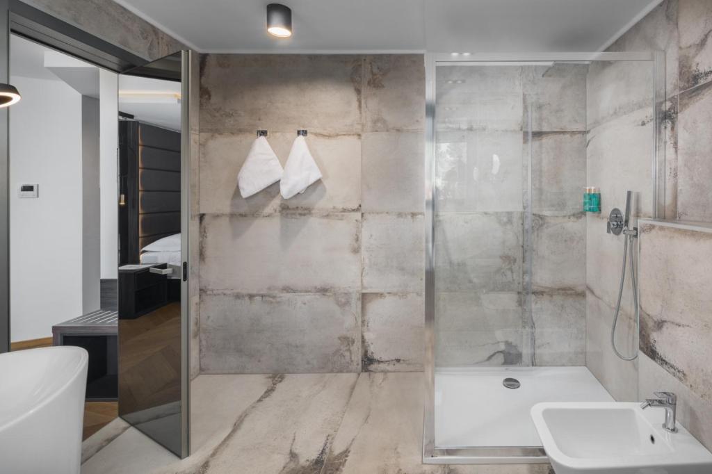 Koupelna v ubytování Hotel Cittar