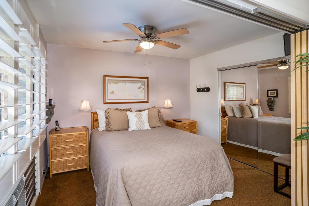 Postel nebo postele na pokoji v ubytování Suite Maui Paradise Condo