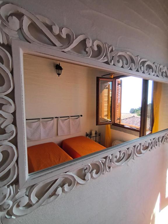 A bed or beds in a room at La Villa Tanca Piras