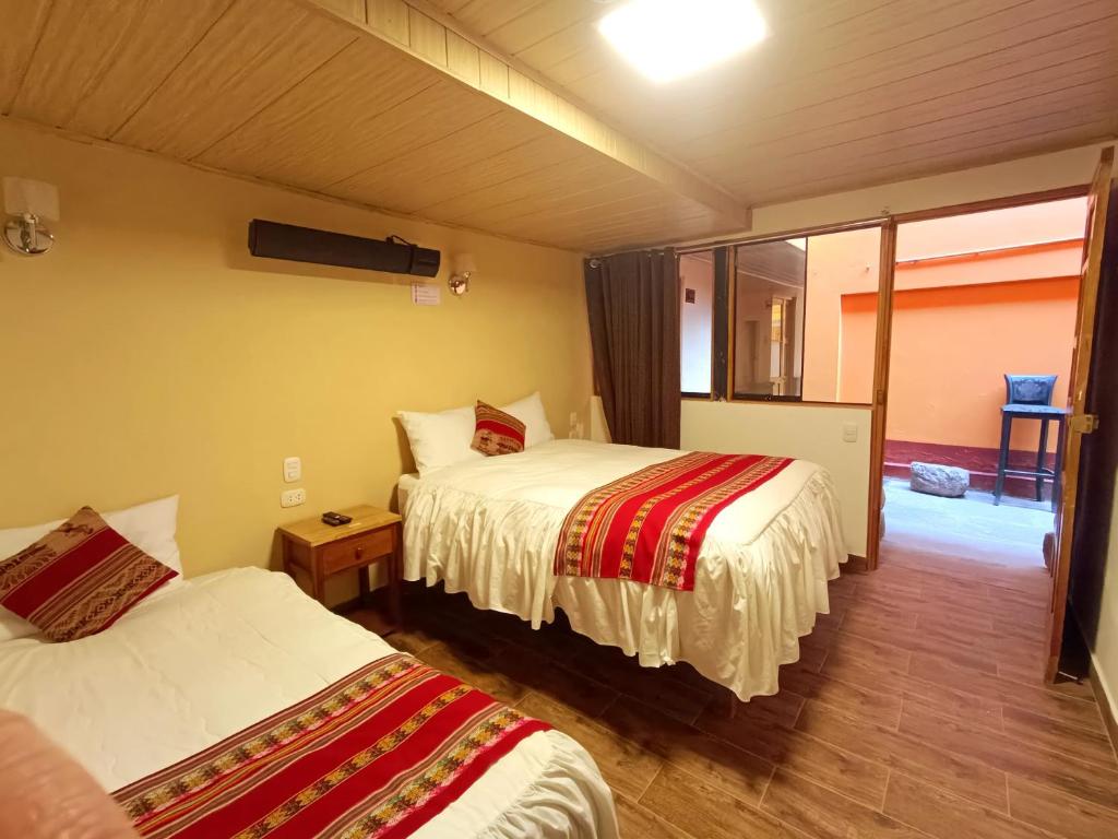 Postel nebo postele na pokoji v ubytování La Posada del Viajero
