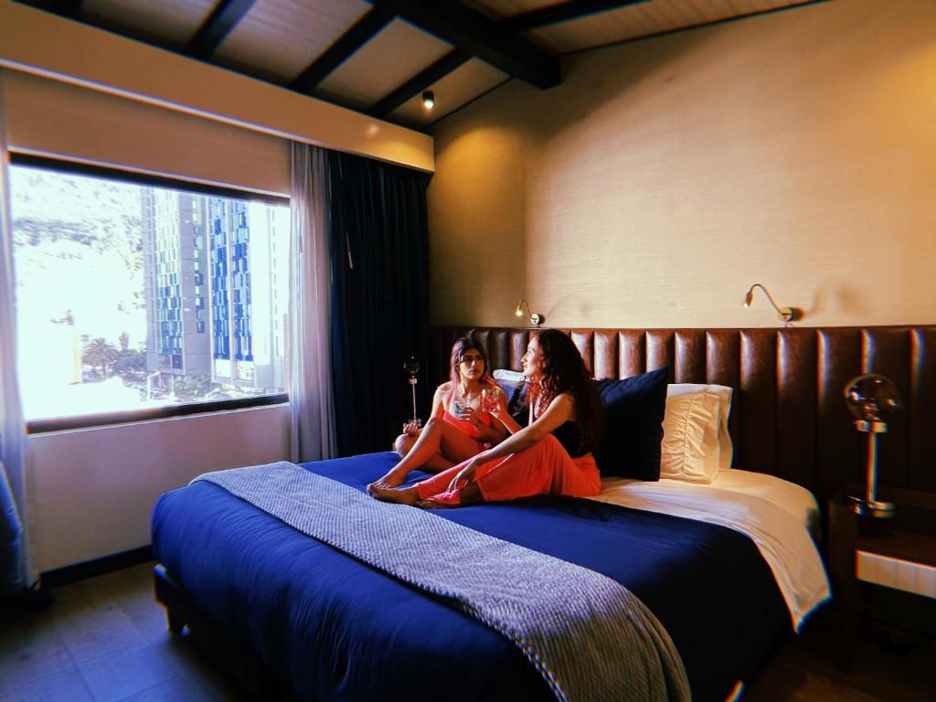 Postel nebo postele na pokoji v ubytování Viajero Bogotá Hostel & Spa