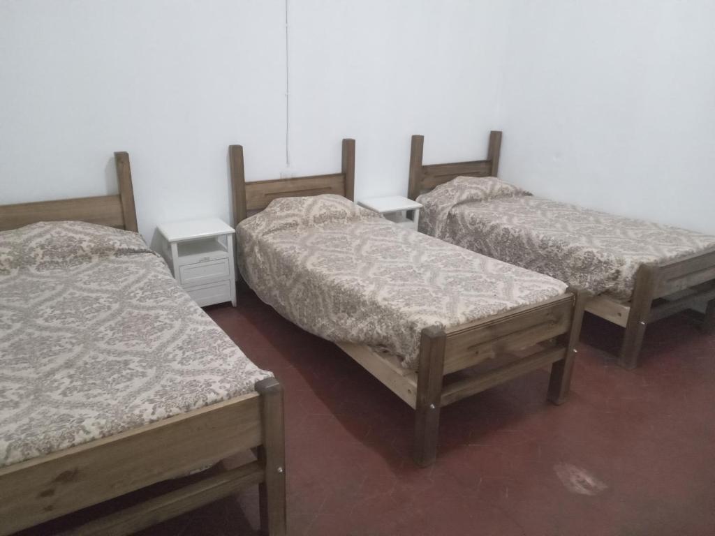 Postel nebo postele na pokoji v ubytování Hostal 4 Estaciones