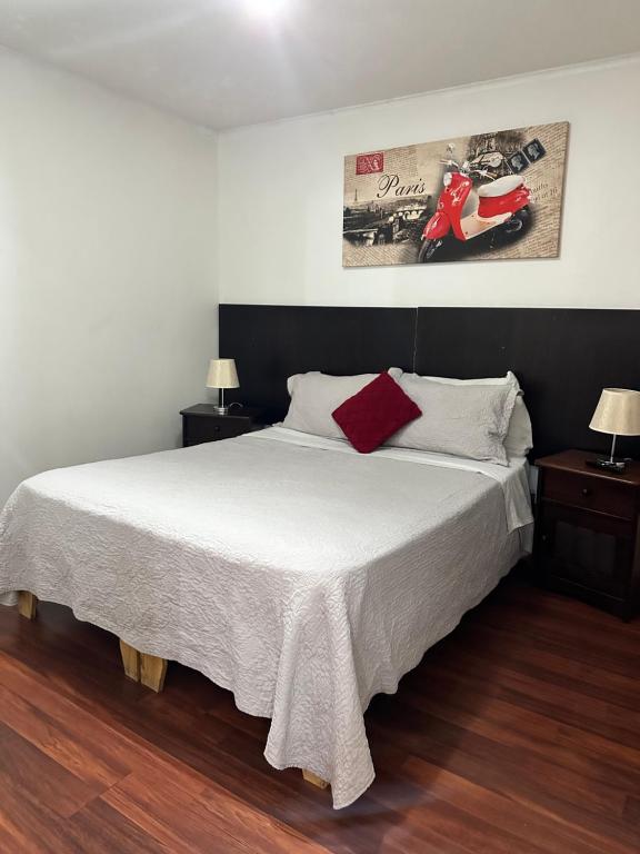 Cama o camas de una habitación en SuitesCentral