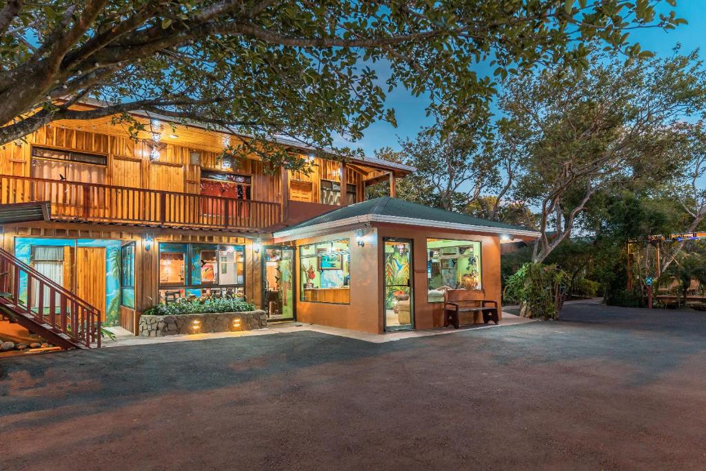 a large house with a lot of windows at Monteverde Villa Lodge in Monteverde Costa Rica