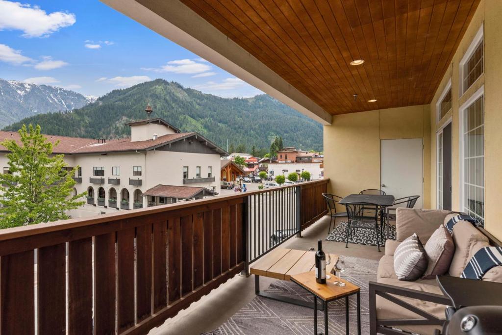 a balcony with a view of the mountains at Apres Ski Chalet in Leavenworth