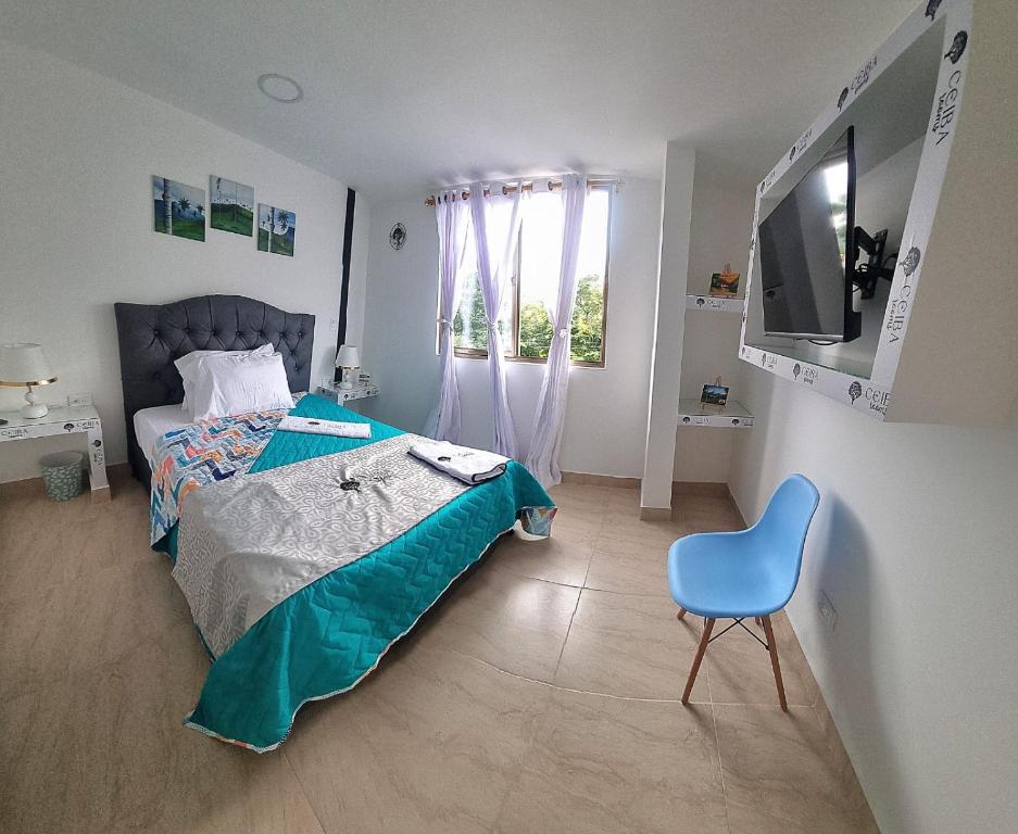 Postel nebo postele na pokoji v ubytování Ayenda Ceiba Rooms