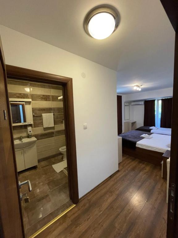 Postel nebo postele na pokoji v ubytování Motel & Restaurant Dar