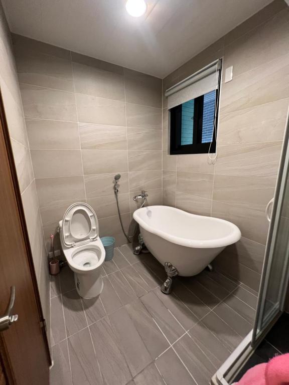 Koupelna v ubytování Panda Homestay
