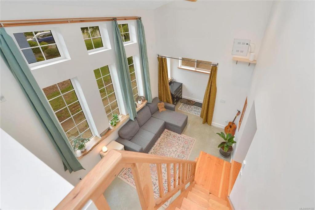 an overhead view of a living room with a couch at Private, stylish guest home in Victoria near Galloping Goose Trail in Victoria