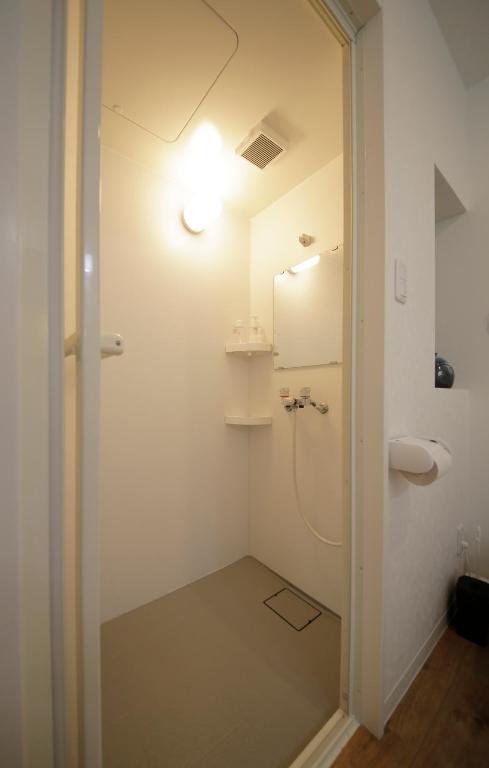Koupelna v ubytování 1F SAKURA RIVER HOUSE, yao 桜と川の家 1F