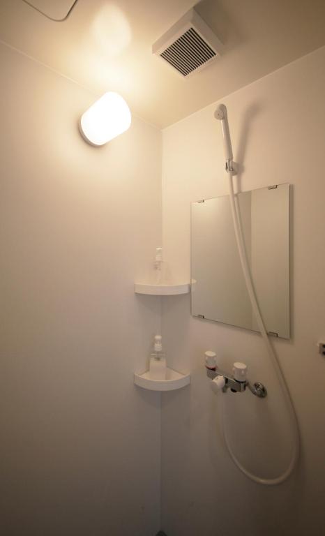 Koupelna v ubytování 1F SAKURA RIVER HOUSE, yao 桜と川の家 1F