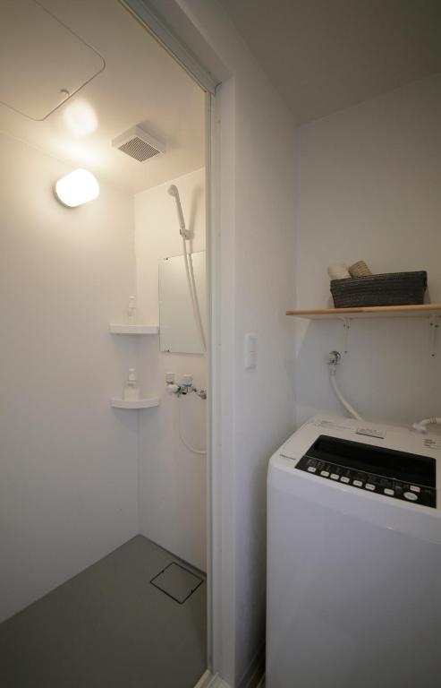 Kuchyň nebo kuchyňský kout v ubytování 2F SAKURA RIVER HOUSE, yao 桜と川の家 2F