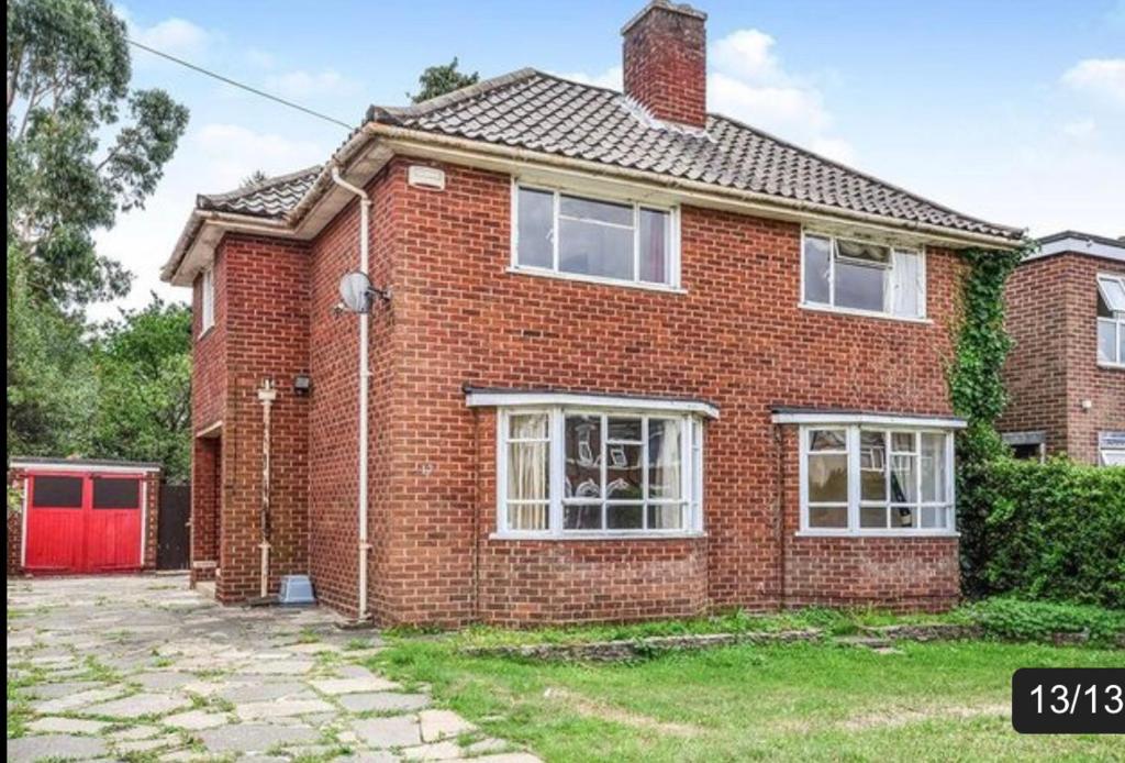 a red brick house with a red door at 17 Howard Road. Southampton in Southampton