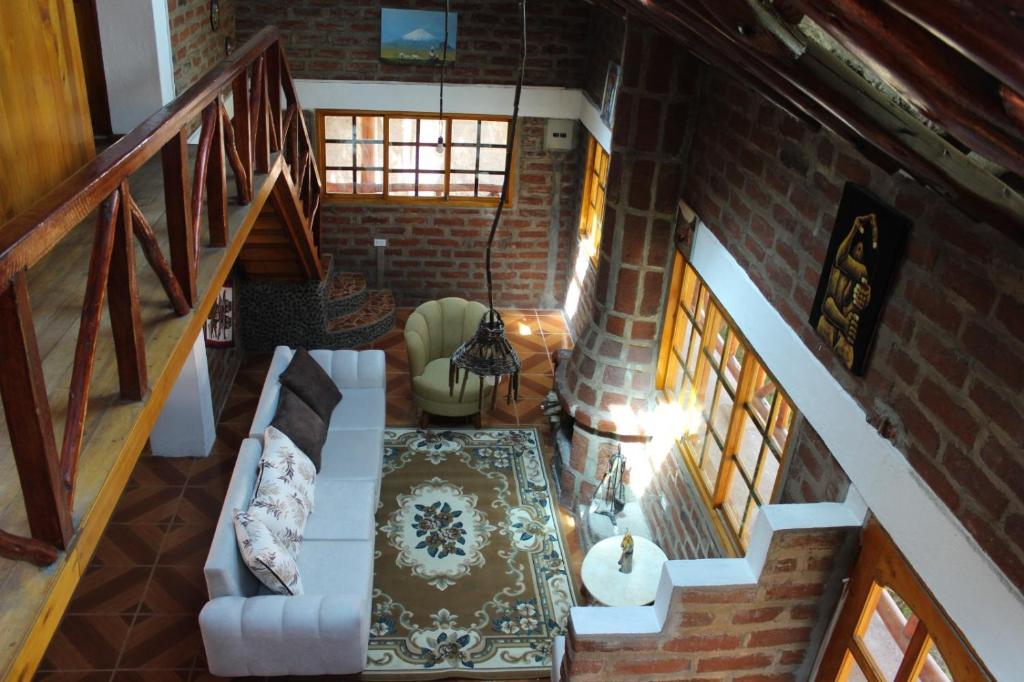 Posezení v ubytování Rumipaxi Lodge