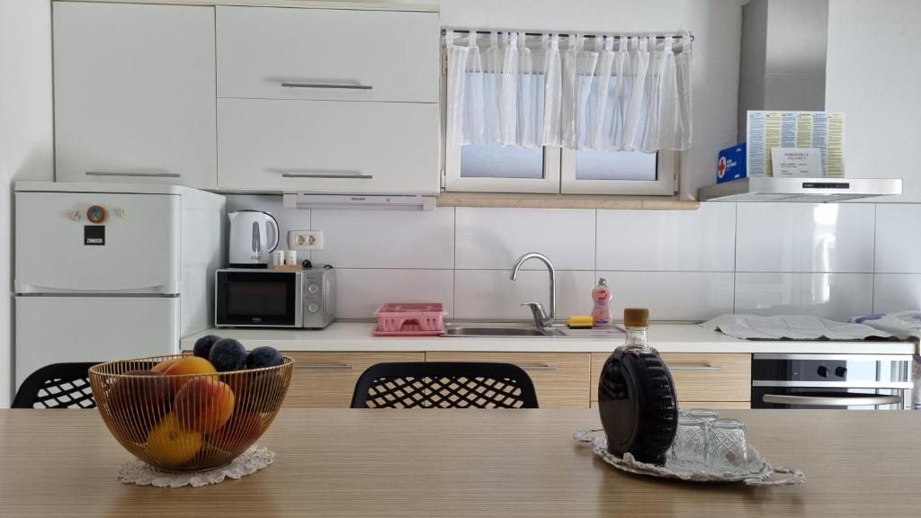 Kuchyň nebo kuchyňský kout v ubytování Apartment Pino