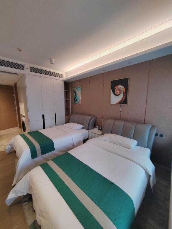 Fuan Hotel - Shenzhen International Convention and Exhibition Center Branch - 豪华双胞胎房间