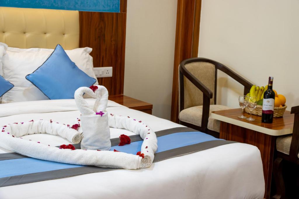 Postel nebo postele na pokoji v ubytování Hotel Dreams Connect GRB 2