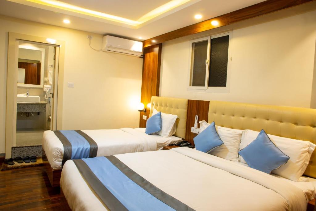 Postel nebo postele na pokoji v ubytování Hotel Dreams Connect GRB 2