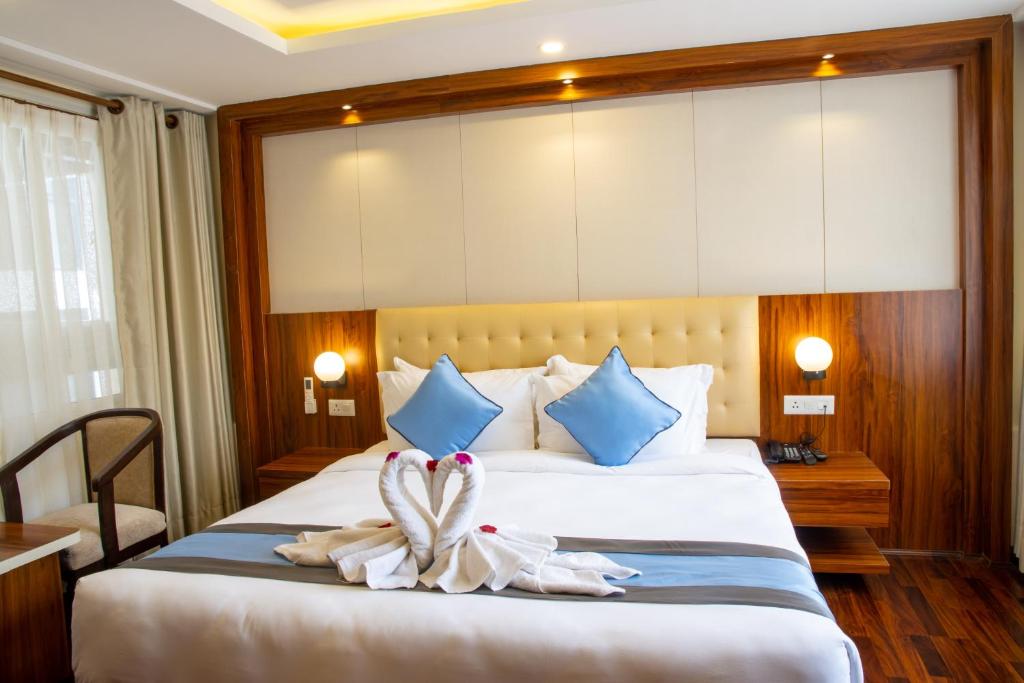 Postel nebo postele na pokoji v ubytování Hotel Dreams Connect GRB 2