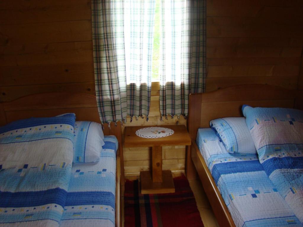 Postel nebo postele na pokoji v ubytování Eco Village Goles