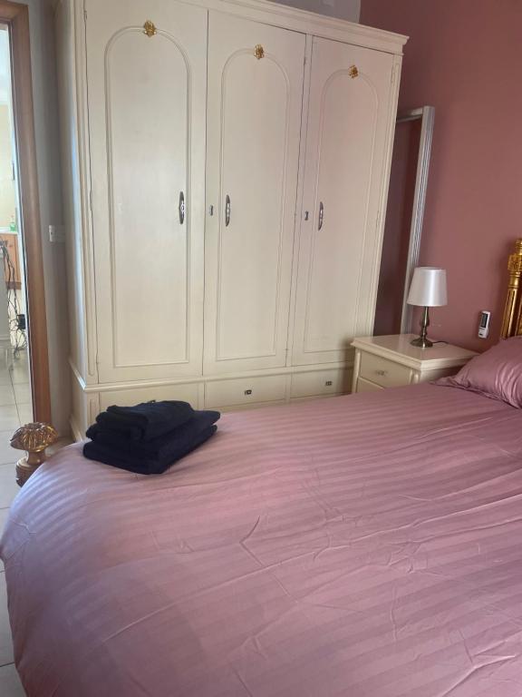 Postel nebo postele na pokoji v ubytování Ix Xaluppa J6 Apartment