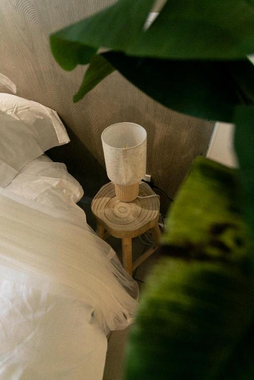 Postel nebo postele na pokoji v ubytování Bali Serenity Balnéo et lit rond