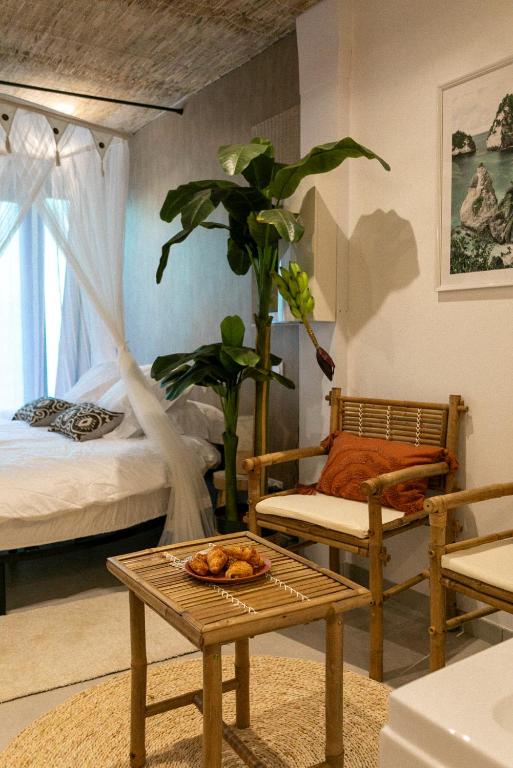 Postel nebo postele na pokoji v ubytování Bali Serenity Balnéo et lit rond