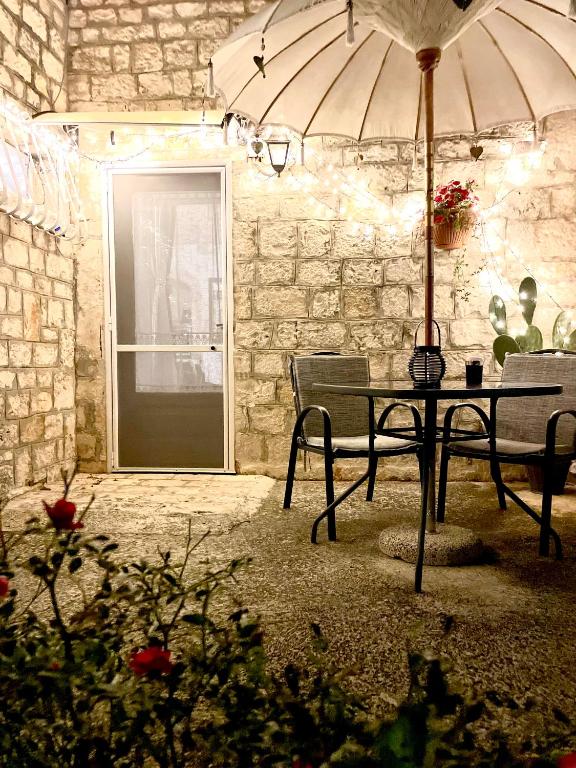 Patio nebo venkovní prostory v ubytování Mirella Charming