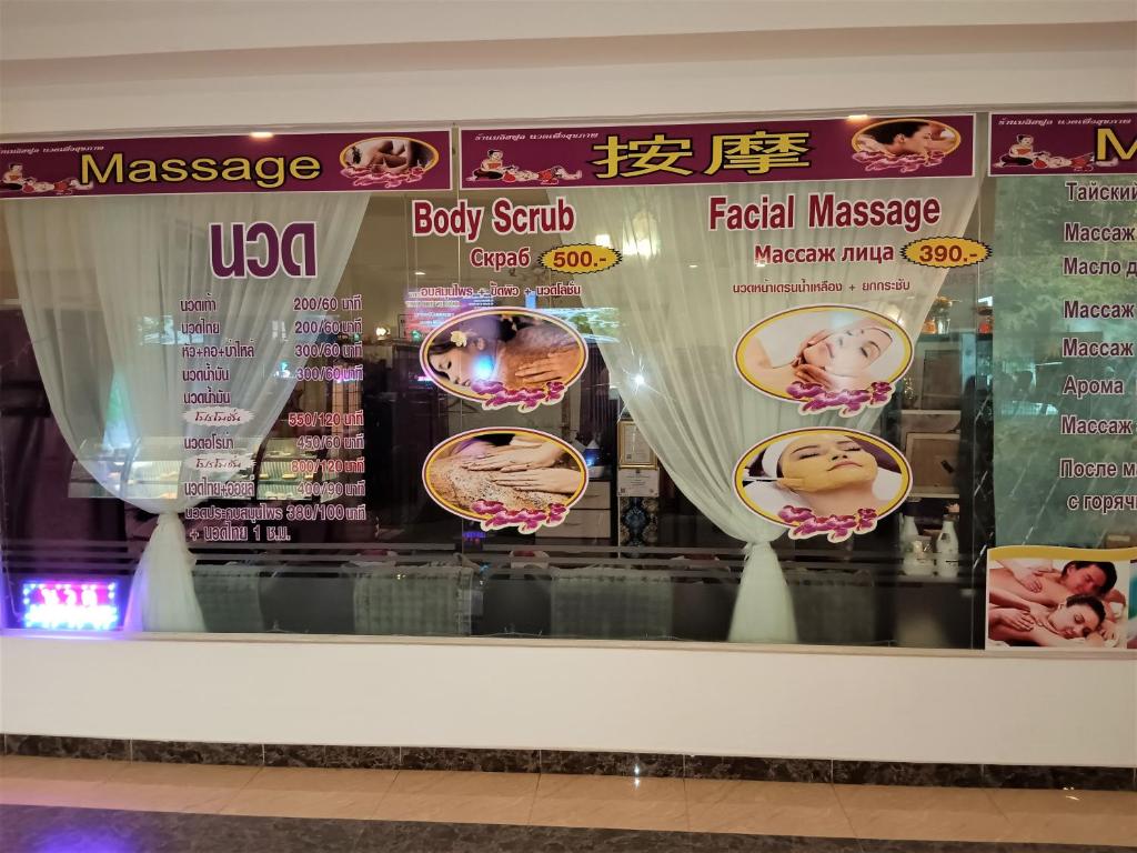 a display case in a store with signs at Laguna Beach Resort 3 Maldives in Jomtien Beach