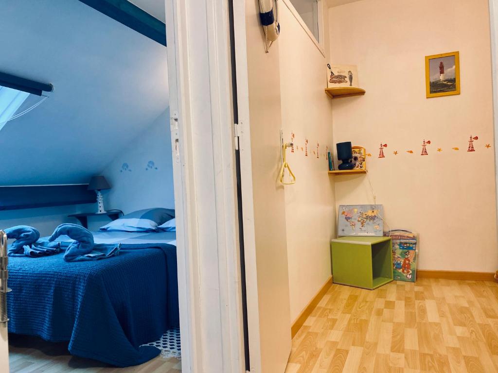 Postel nebo postele na pokoji v ubytování Le Gîte du Phare vue sur mer