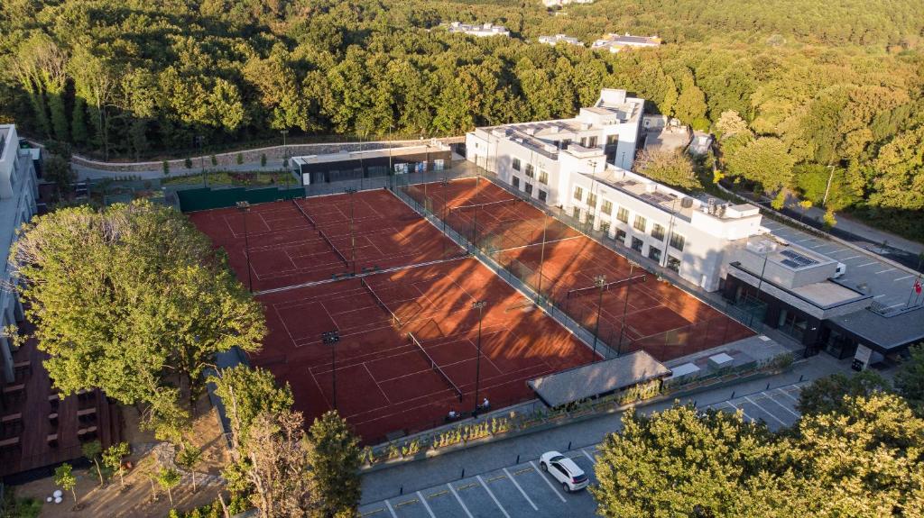 an overhead view of a building with a tennis court at INVENTIST Hotel Sports Academy Istanbul in Istanbul