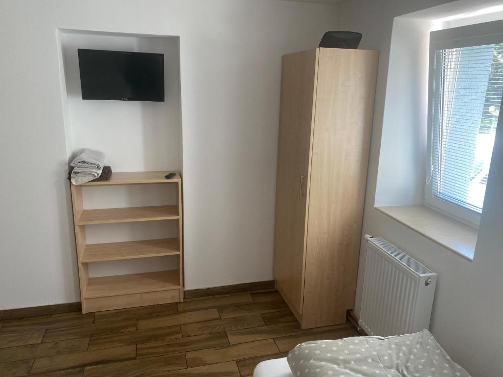 TV a/nebo společenská místnost v ubytování Penzion Norden