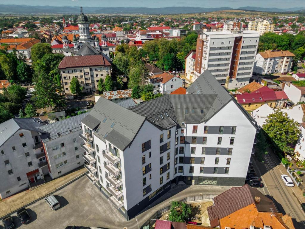 an overhead view of a building in a city at DownTown Apartments in Rădăuţi